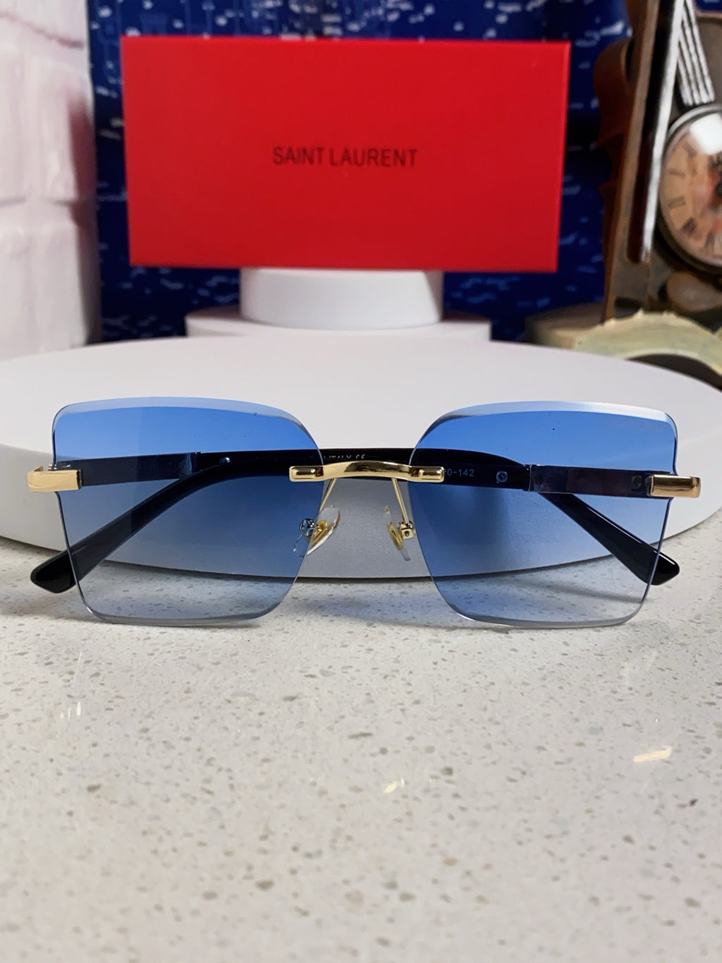 Saint Laurent Lightweight Rimless Blue Lens Sunglasses for Men & Women - detail image 8