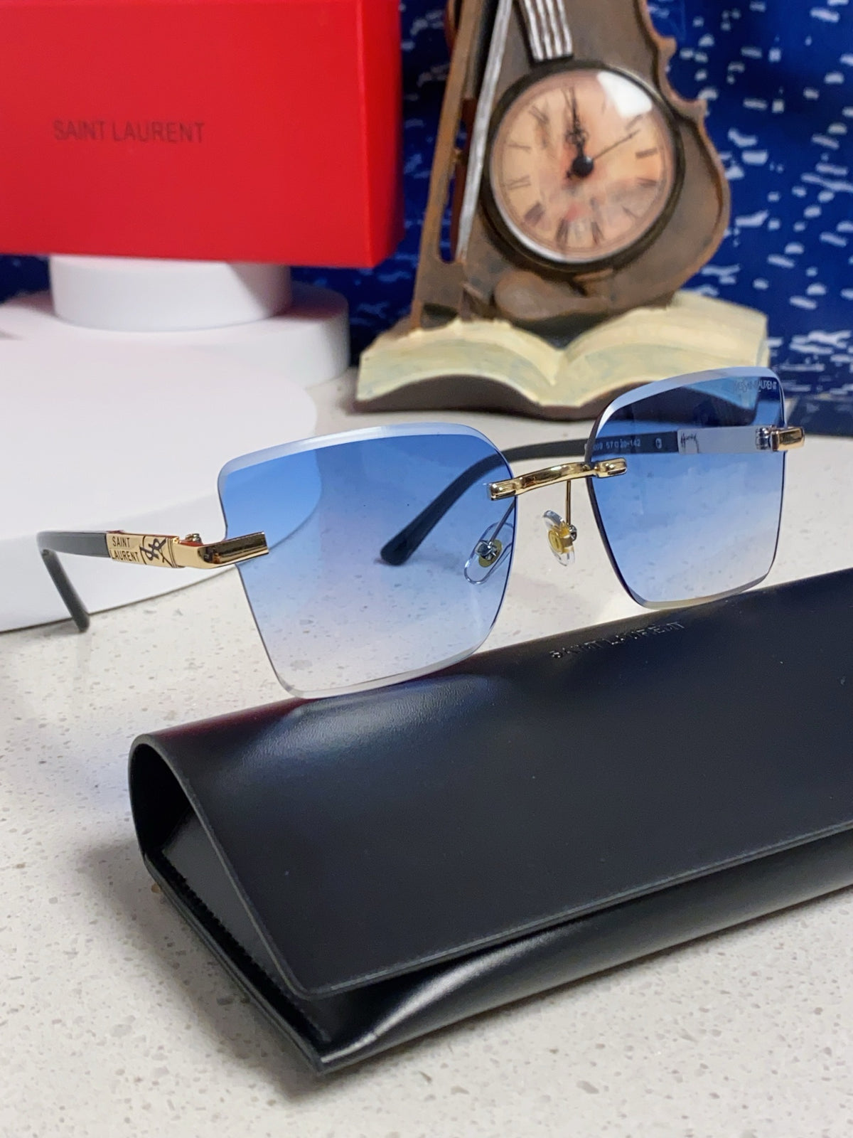 Saint Laurent Lightweight Rimless Blue Lens Sunglasses for Men & Women - detail image 9