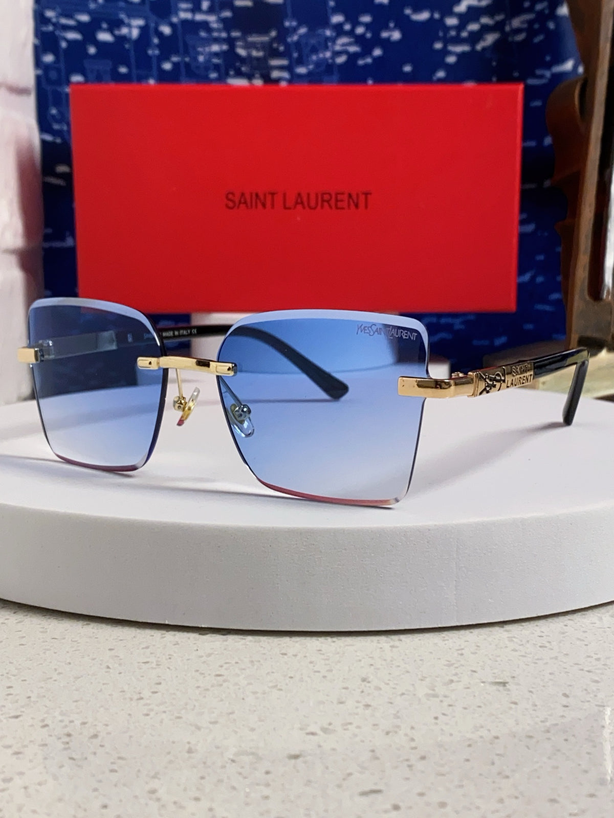 Saint Laurent Lightweight Rimless Blue Lens Sunglasses for Men & Women
